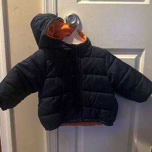 Infant size 12 months puffer jacket, fleece lined.